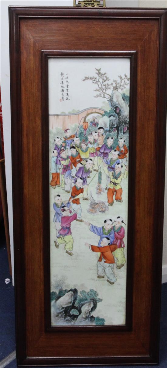 A set of four large Chinese famille rose hundred boys porcelain plaques, 20th century, total size 98.5 x 41cm
